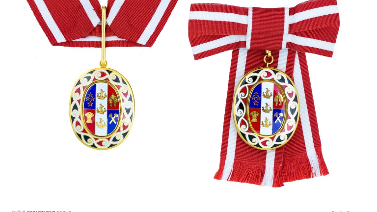 Badge of a Member of the Order of New Zealand (two badges shown side-by-side on neck ribbon and ribbon bow respectively)