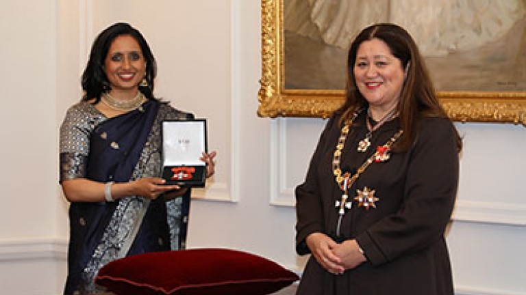 Governor-General investing Vanisa Dhiru 