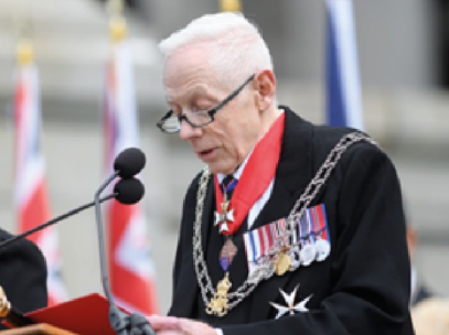 New Zealand Herald of Arms Extraordinary, Phillip O'Shea, reads the Proclamation of Accession.