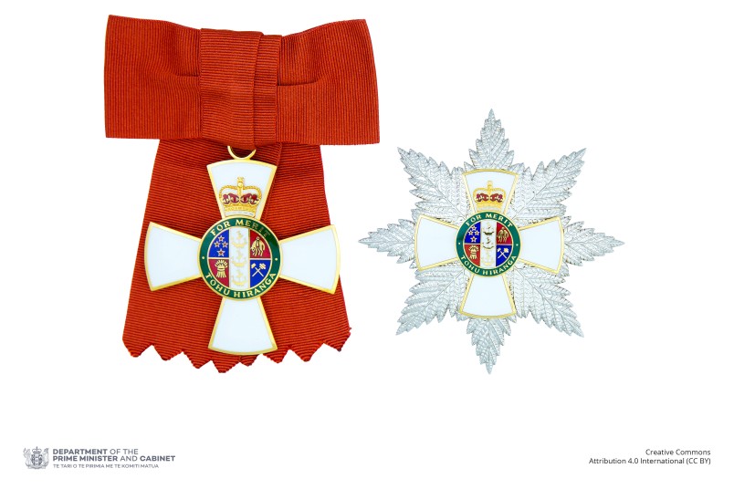 Insignia of a Dame Companion of the New Zealand Order of Merit (badge on ribbon bow and breast star)