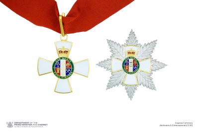 Insignia of a Knight Companion of the New Zealand Order of Merit (badge on neck ribbon and breast star)