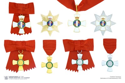 Composite of the full-size insignia of the five levels of the New Zealand Order of Merit