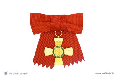 Insignia of an Officer of the New Zealand Order of Merit (on ribbon bow)